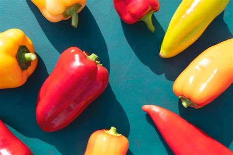 premium photo colorful sweet peppers   green background  bright