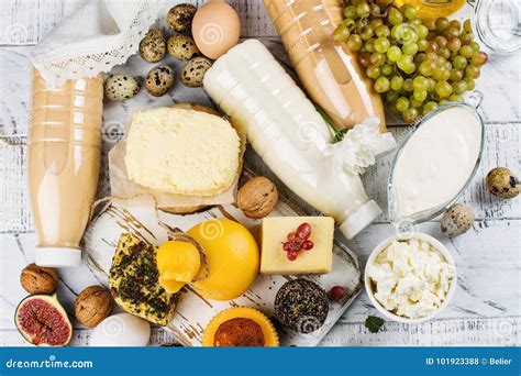 Assortment of Dairy Farm Products on Wooden Table Stock Photo - Image of homemade, balanced ...