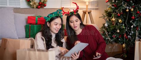 Lgbt Bonding Lesbian Couple Enjoying Interactive Festive Planning Stock Photo Image Of