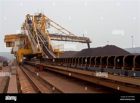 Iron Ore Stockpile Storage On The Docks In Tianjin Port China Stock