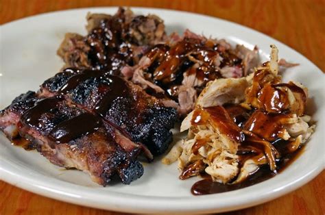 Ribs Smoked Beef Brisket Pulled Pork And Pulled Chicken Plate Feast Your Eyes On Our Smoked Bbq