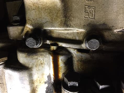 Why Is My Car Leaking Oil After An Oil Change / Del Sol 95 B18C1 leak
