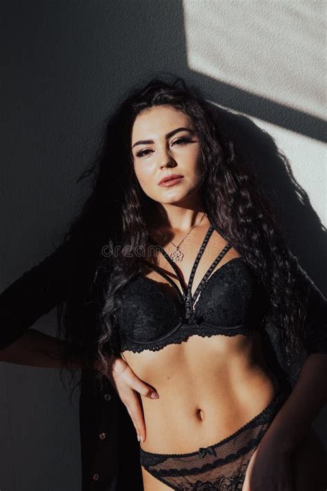 Portrait Of A Beautiful Brunette Woman In Black Lingerie Posing Stock Image Image Of Hand