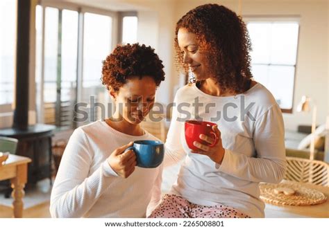 Happy Diverse Lesbian Couple Drinking Coffee Stock Photo 2265008801 Shutterstock