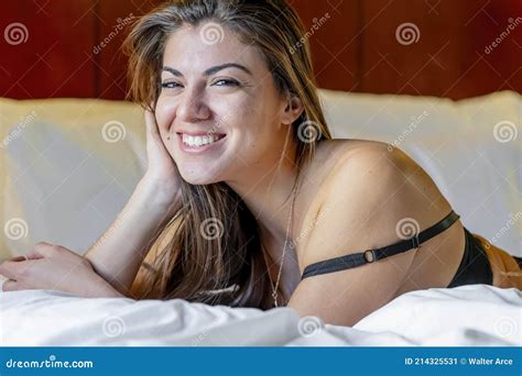 Gorgeous Hispanic Model Poses In Lingerie In A Bedroom Environment Stock Image Image Of