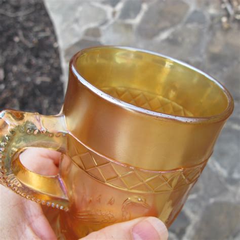 Antique Dugan Stork And Rushes Lattice Band Marigold Carnival Glass Mug Carnival Glass