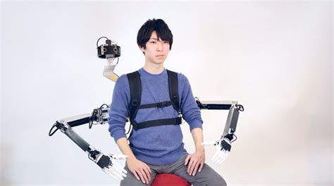 The Power Of Robotic Arms Gives This Guy Multiple Limbs To Work With