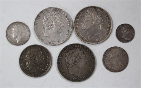 A Group Of Five George Iii Silver Coins Comprising Two Crowns