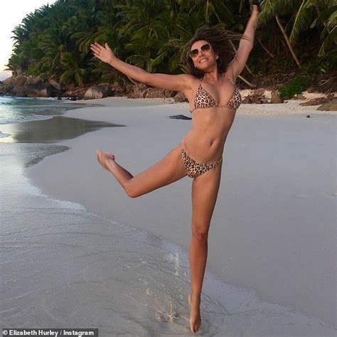 Elizabeth Hurley Flaunts Her Svelte Frame In A Tiny Leopard Print Bikini Daily Mail Online