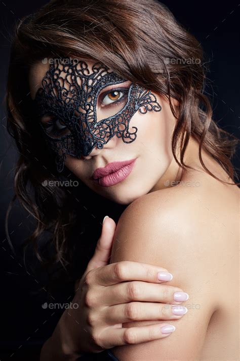 Mysterious Girl In A Black Mask Masquerade Sexy Nude Brunette Woman With Curly Hair On A Black