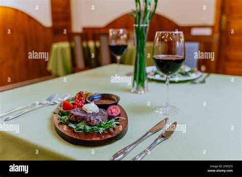 Healthy Dinner Table For Two With Plates Of Tasty Appetizing Food And