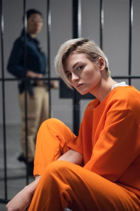 Cute Blonde On A Photo Shoot In The Prison Stays Behind Bars Stock Image Image Of Alone