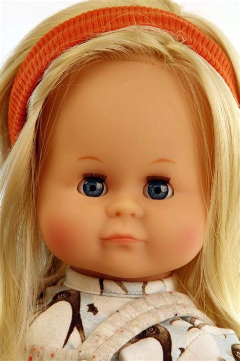 Puppe Schlummerle 37 cm blonde Haare blaue Schlafaugen Pinguinkleidung Mädchen Haarpuppen
