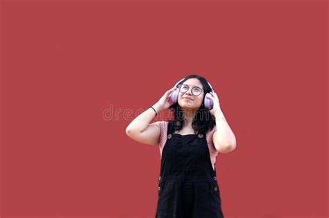 Year Old Latina Woman Points To Something That She Likes Surprises And Excites Such As