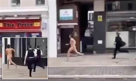 Bizarre Moment A Naked Man Sprints Down A London Street With Three