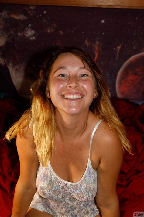 Brunette Renee Wilson Having Fun Doing Striptease And Showing Her Tits Photos