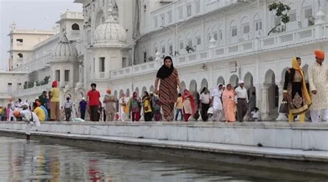 Sikhs And Indian People Visiting The Gol Stock Video Pond