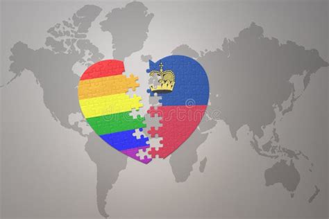 Puzzle Heart With The Rainbow Gay Flag And Liechtenstein On A World Map Background Concept