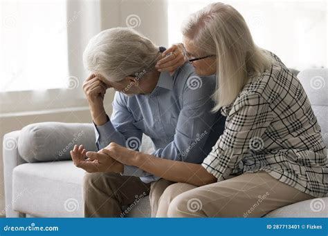 Concerned Caring Mature Wife Touching Hand Of Desperate Older Husband Stock Image Image Of