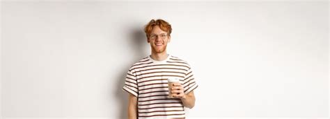 Free Photo Handsome Young Man With Beard And Red Messy Hair Wearing