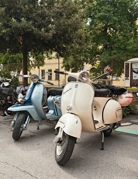 Vintage Italian Scooters Vespa And Lambretta Parked During The XXIX