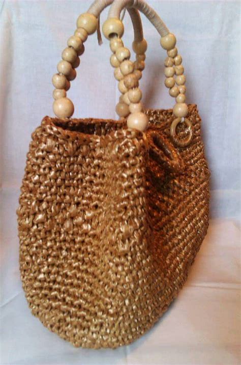 Pin by Begoña Mesones on Bolsos y carteras crochet trapillo Straw bag