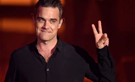 Роби Уилямс открива световното, но без песента "Празнувай като руснак ...