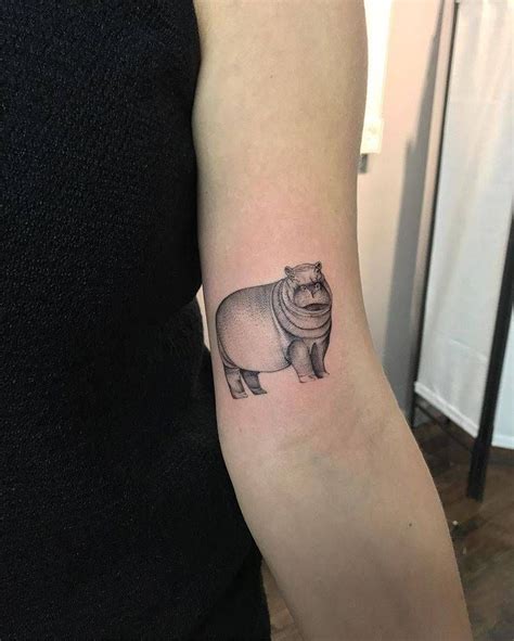 Hippopotamus Tattoo On The Left Bicep Hippo Tattoo Tattoos Sacred