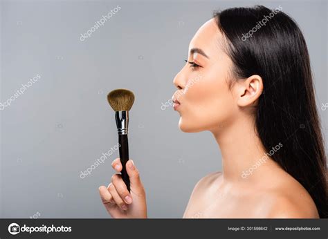 Side View Beautiful Naked Asian Woman Cosmetic Brush Isolated Grey