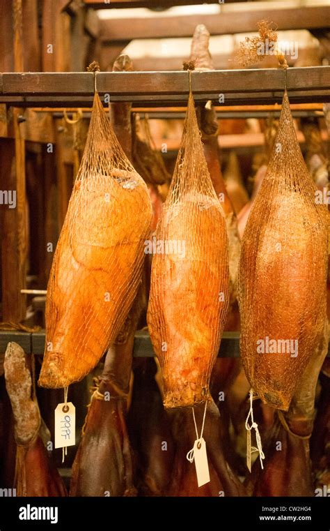 Salt Cured Hams Hanging Stock Photo Alamy