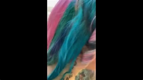 Slut With Multi Colored Hair Masturbates With A Suction Cup Dildo