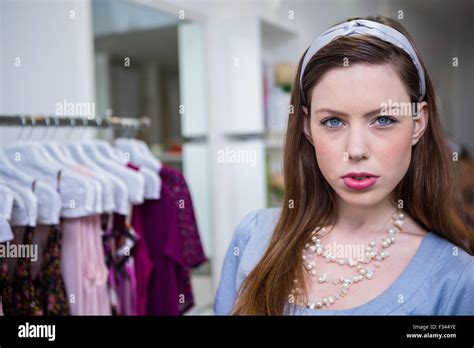 Brunette Pouting At The Camera Stock Photo Alamy