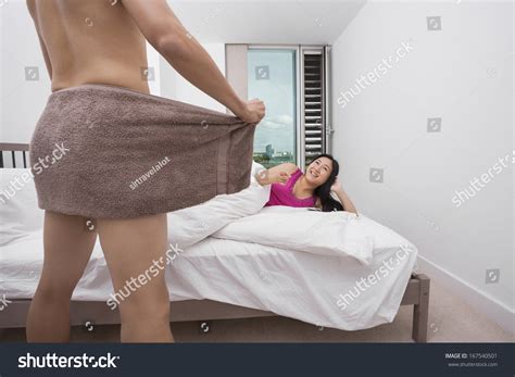 Happy Woman Looking Nude Man Holding Stock Photo Edit Now Shutterstock