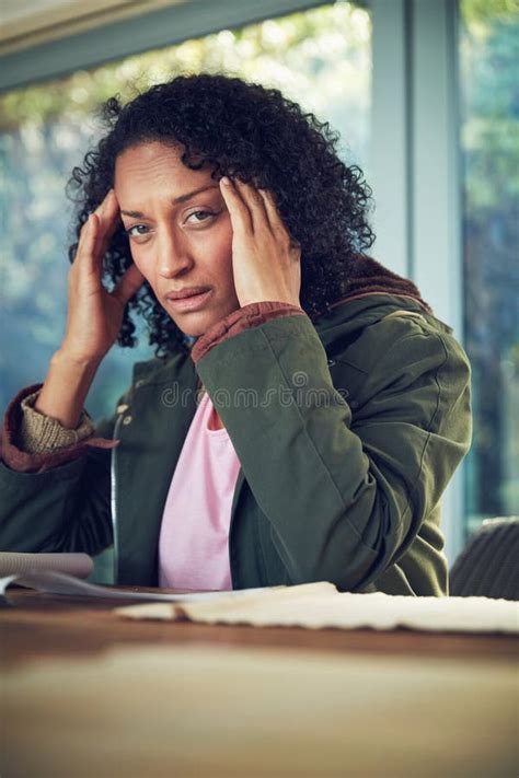 My Head Is Pounding Portrait Of A Mature Woman Experiencing A Headache