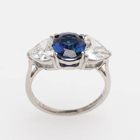 Ring Med Bl Safir Och Diamanter Smycken Delstenar Ringar Auctionet