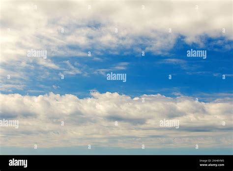 Blue sky with clouds pattern nature background Stock Photo - Alamy