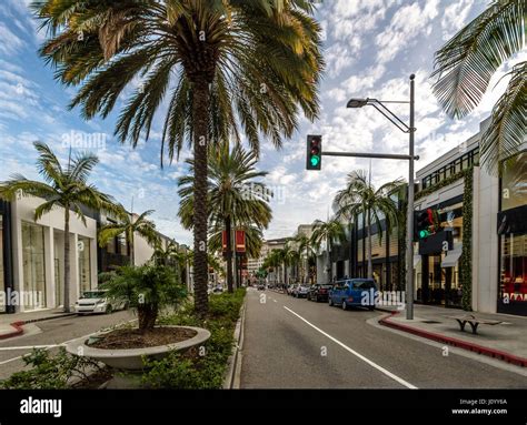 Rodeo Drive Street With Stores And Palm Trees In Beverly Hills Los