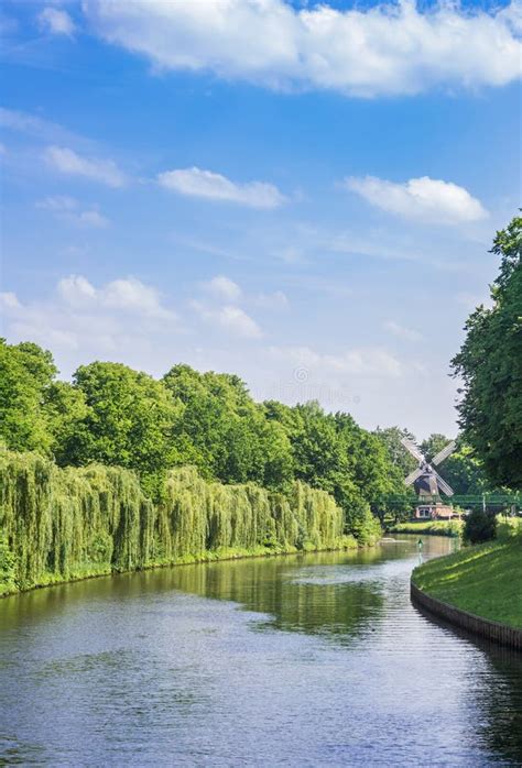 river hasse leading   historic holtingmuhlen windmill  meppen
