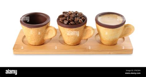 Edible Biscuit Cups With Espresso Coffee Beans And Empty One On White