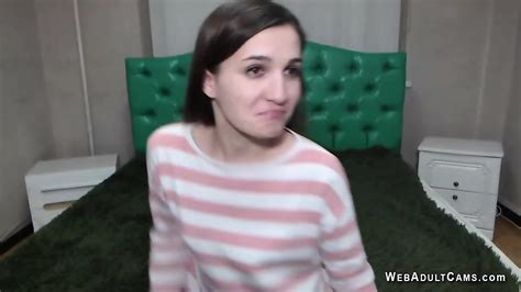 Hot European Brunette Babe Laying Dressed In Bed