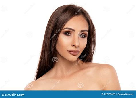 Close Up Portrait Of A Brunette Nude Model Girl With Professional Evening Make Up And Plump Lips
