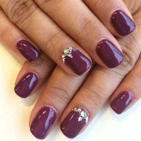 Bio Sculpture Gel 86 Dark Plum With A Feature Nail Design Using A Combination Of Rhinestones