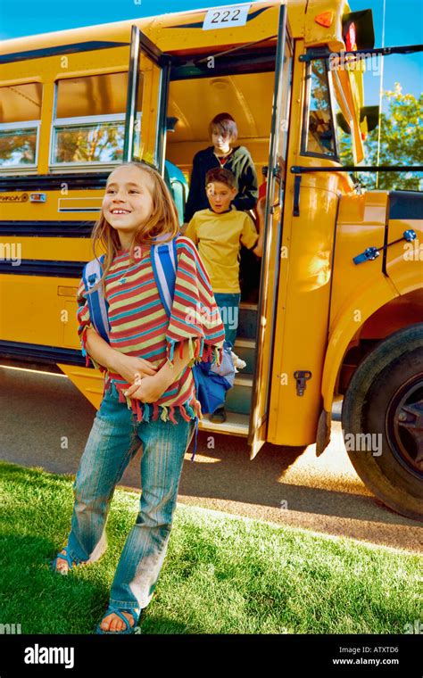 Children getting off school bus Stock Photo: 5357781 - Alamy