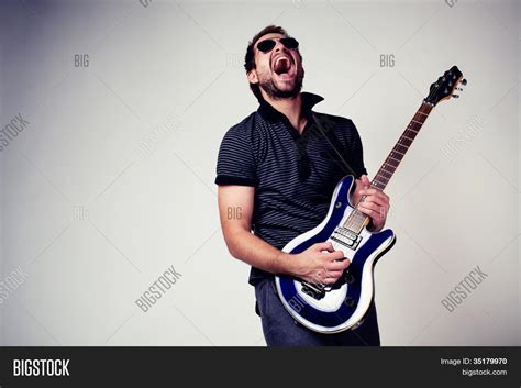 Rockstar Guitar Player Image & Photo | Bigstock