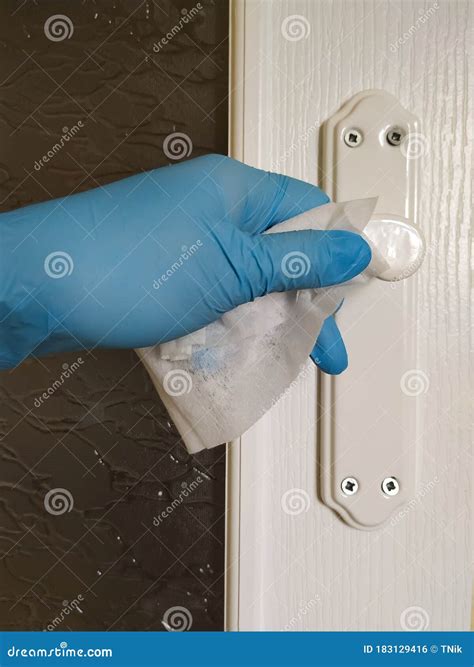 Disinfection of Door Handles. Prevention of Coronavirus Infection Stock