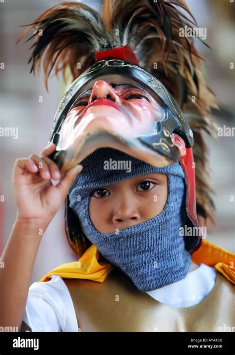 Philippines Boy In Moriones Masks At The Annual Moriones Festival