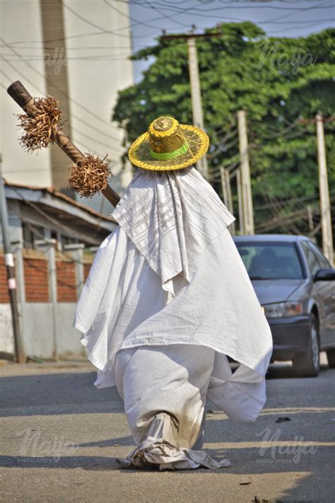 ANOTHER EYO MASQUERADE ON THE STREET OF LAGOS - Naija Photo Stock