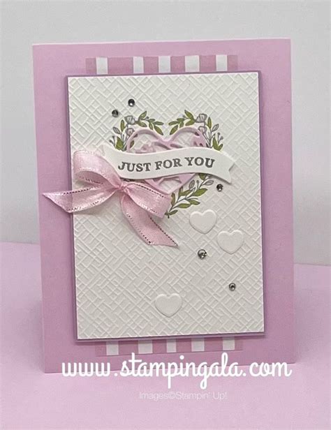 A Card With Hearts And Ribbon On The Front Saying Just For You In Pink