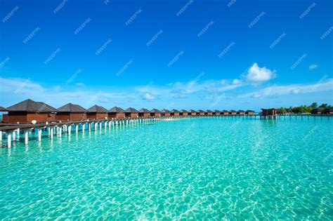 Premium Photo | Tropical Maldives island with beach