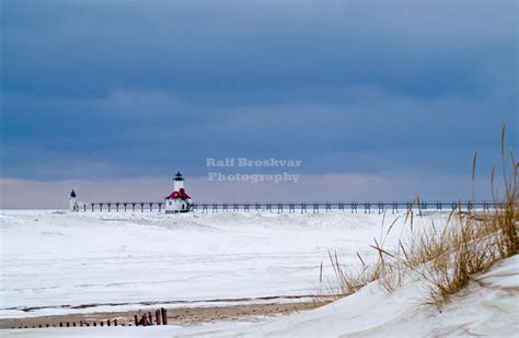 Winter at St. Joseph North Pier Lighthouse in St Joseph, Lake Michigan ...